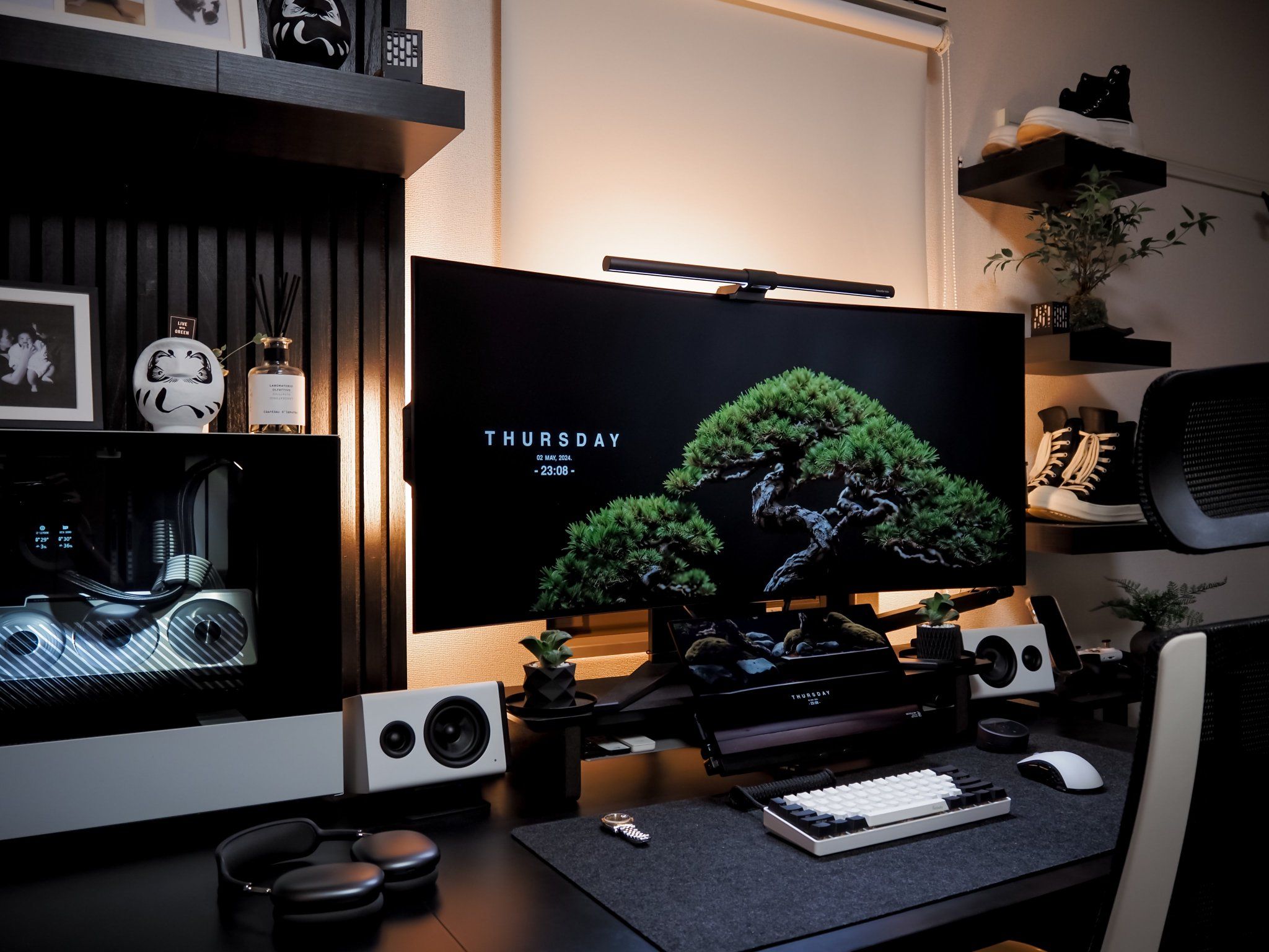 A clean, modern gaming review studio with blue neon ambient backlighting