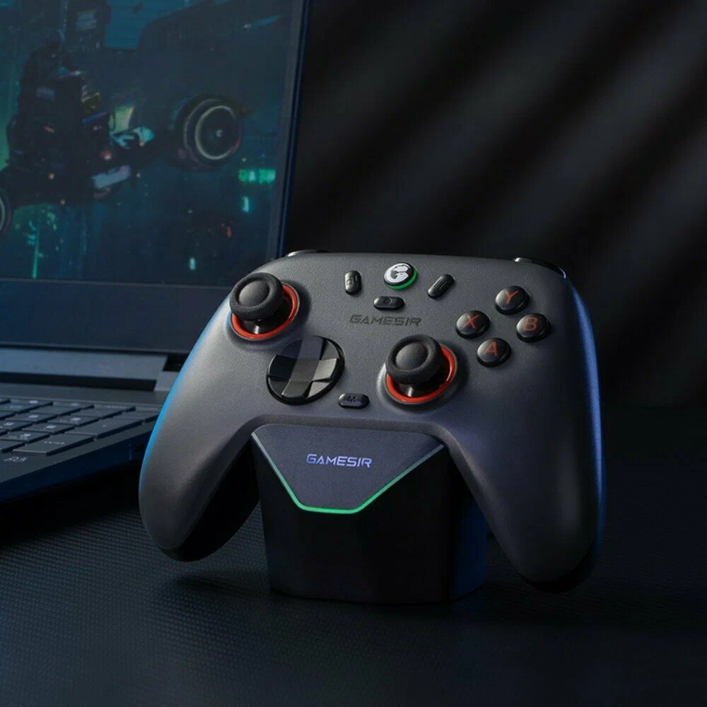 A modern wireless gaming controller sitting on a glowing blue desk surface
